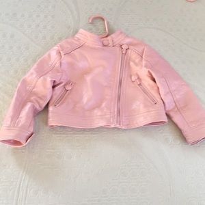 Leather shiny pink jacket for a baby girl